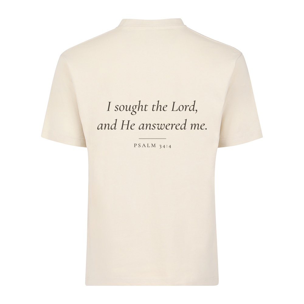He Answers tee in bone, Psalm 34:4 on the back