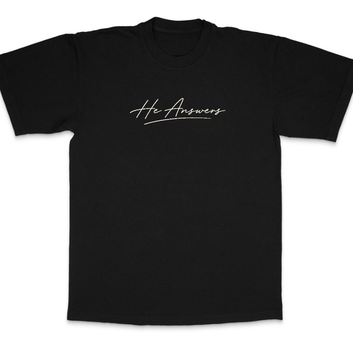 He Answers tee in black, front